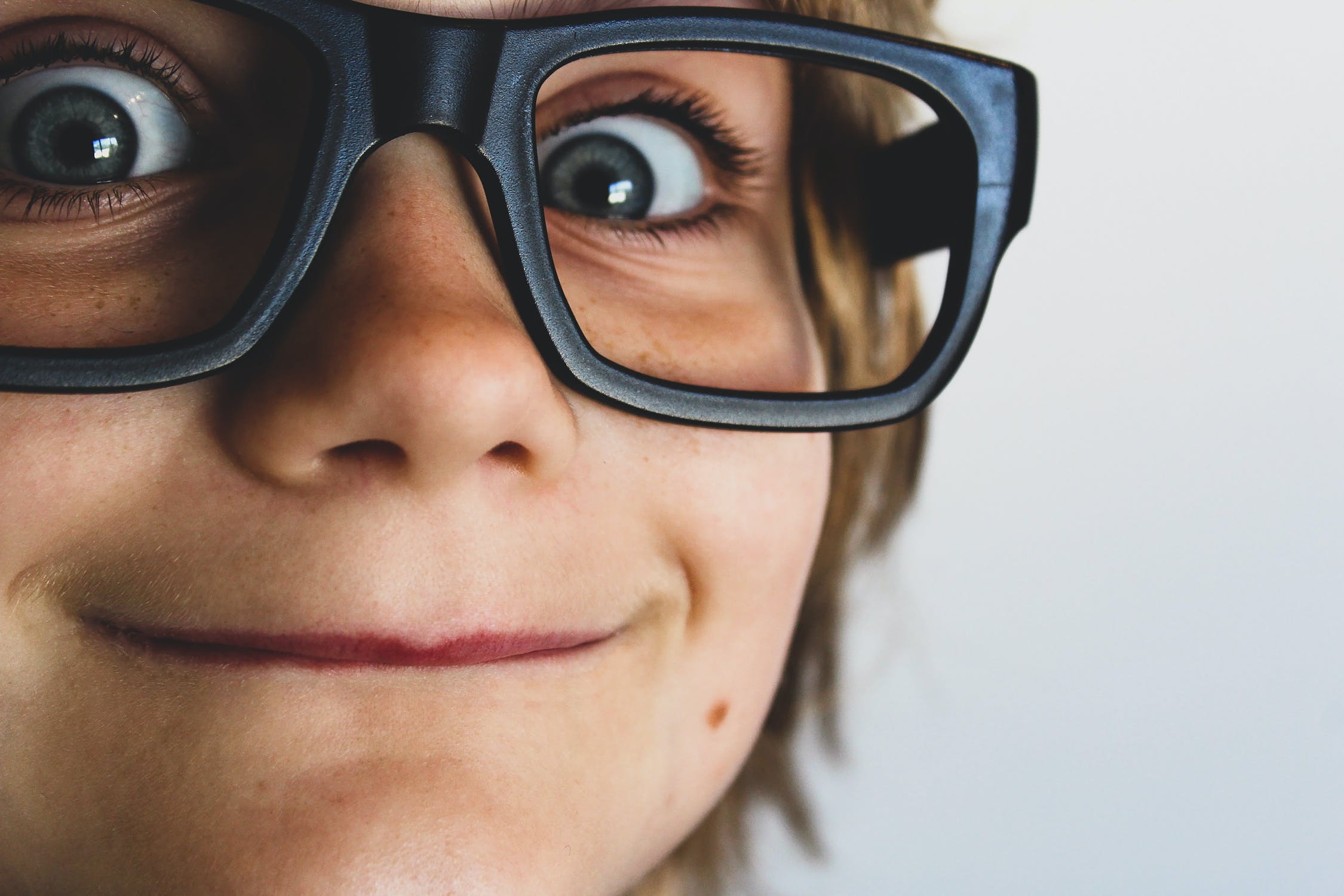 Close up of boy with glasses